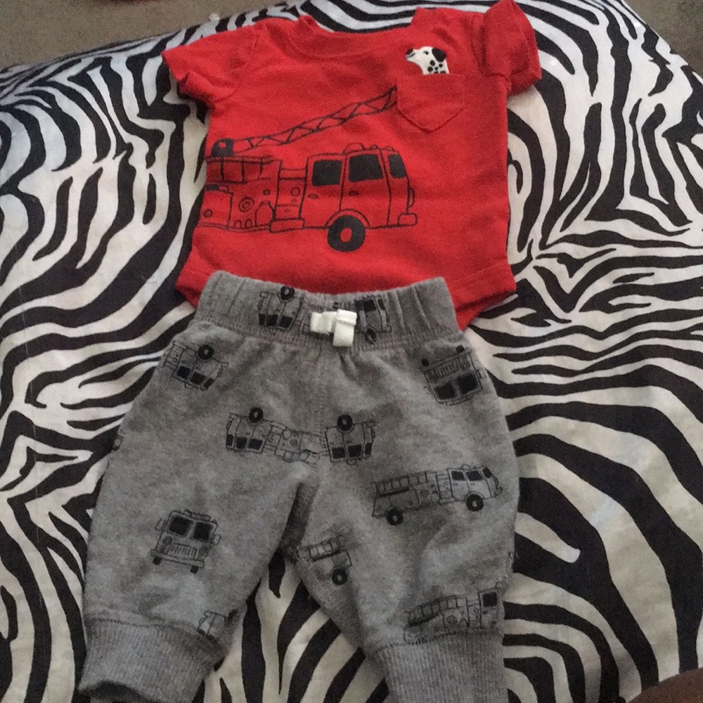 Grey fire truck pants and a red fire truck onesie